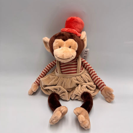 Małpka BUKOWSKI Winston w bezowych spodenkach - 25 cm 