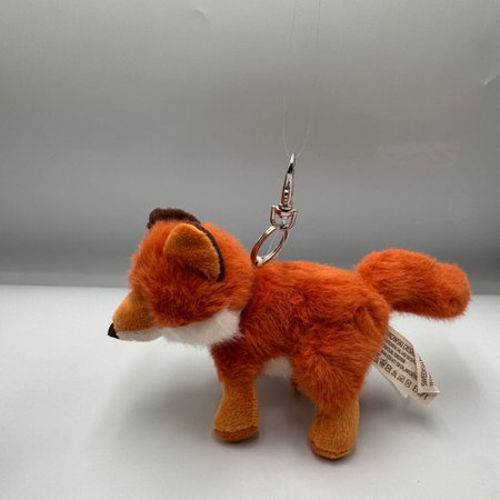 Pluszowy rudy lisek Bukowski Clever Fox z metalowym kółeczkiem do przypięcia.