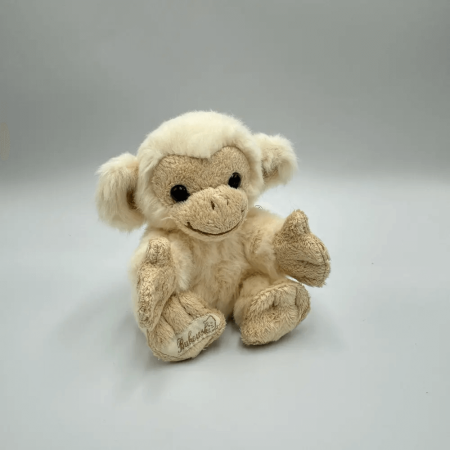 Małpka BUKOWSKI Baby Bernard kremowa - 15 cm